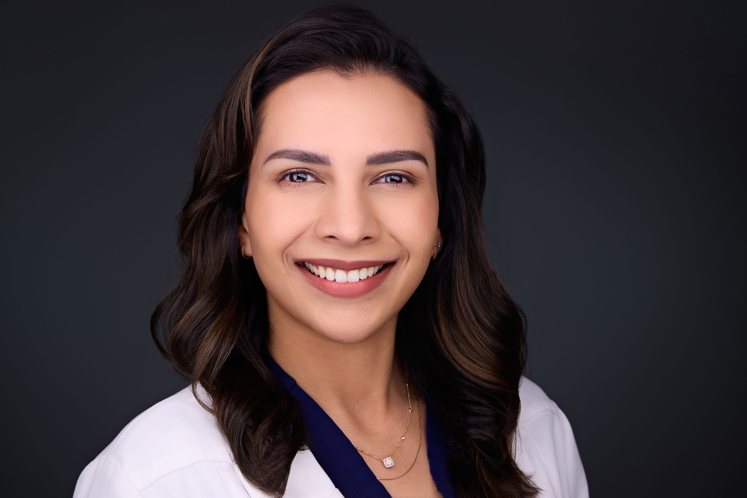 Smiles-on-Enterprise-Oak-Brook-IL-Dr-Jessica-Reddy-Professional-Headshot-White-Coat